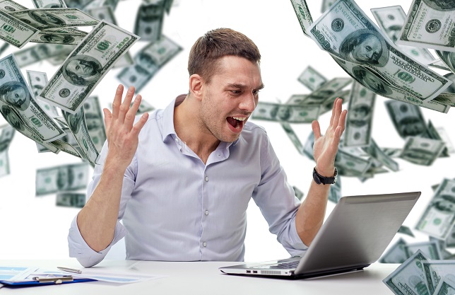 business, people, stress, fail and technology concept - angry businessman with laptop computer and papers shouting over falling money background